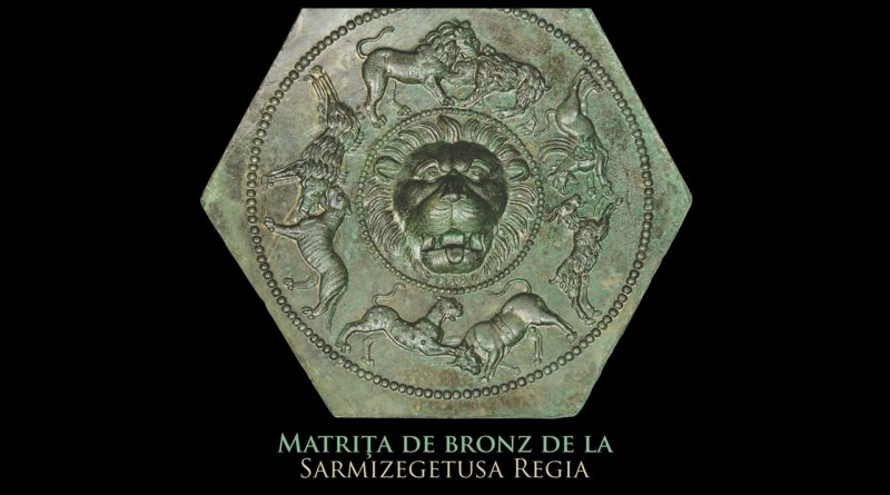 Matrița dacică din bronz, expusă la Muzeul Civilizației Dacice și Romane din Deva, având gravuri detaliate ale unor animale mitologice și reale, utilizată în meșteșugurile dacice.